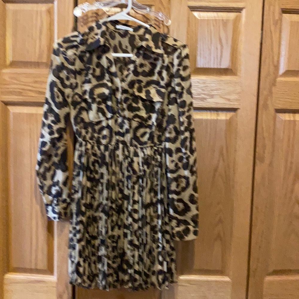 This dress is fun for all seasons, it’s sheer, with lining from waist down.